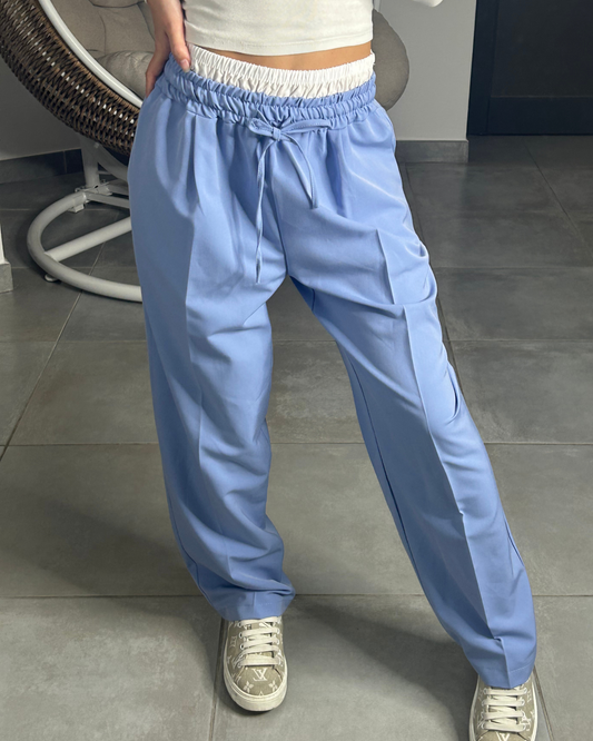Pantalon bleu à détails blanc